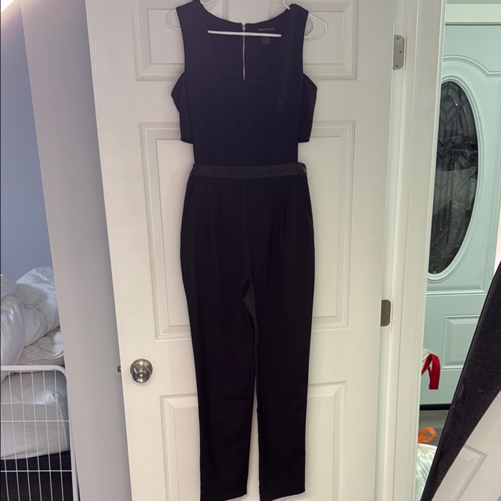 Black Sleeveless Jumpsuit with Fitted Bodice and Tapered Legs